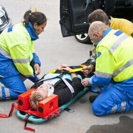 Medical team tending to person